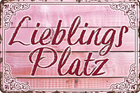 Pinkfarbenes Blechschild mit der Aufschrift Lieblingsplatz in eleganter Schrift